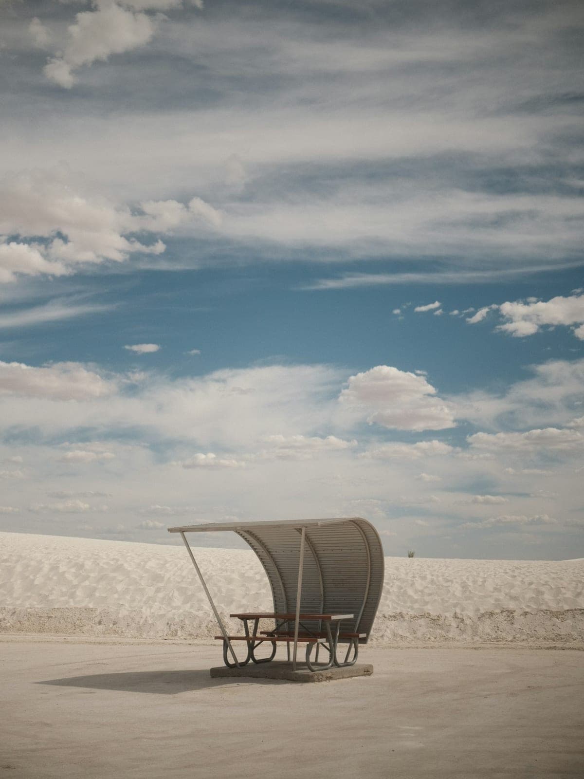 A sheltered table, alone in the desert