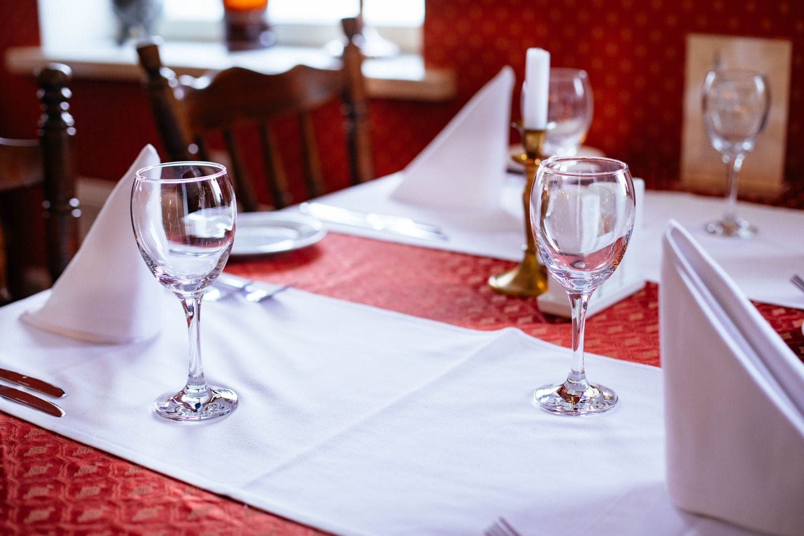 A table laid by candlelight