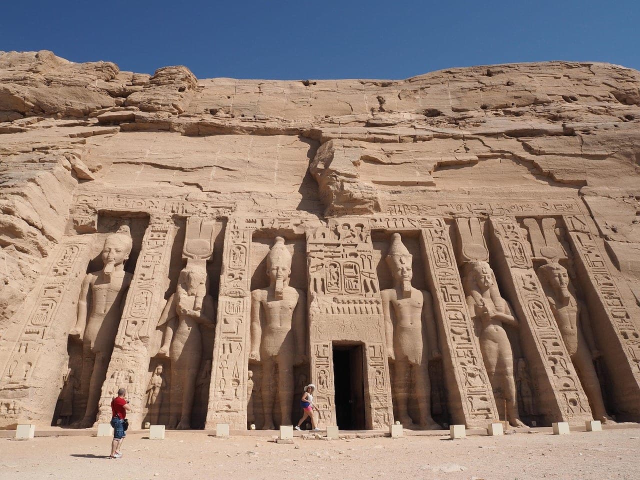 The small temple of Nefertari — the figures at the door give the scale.