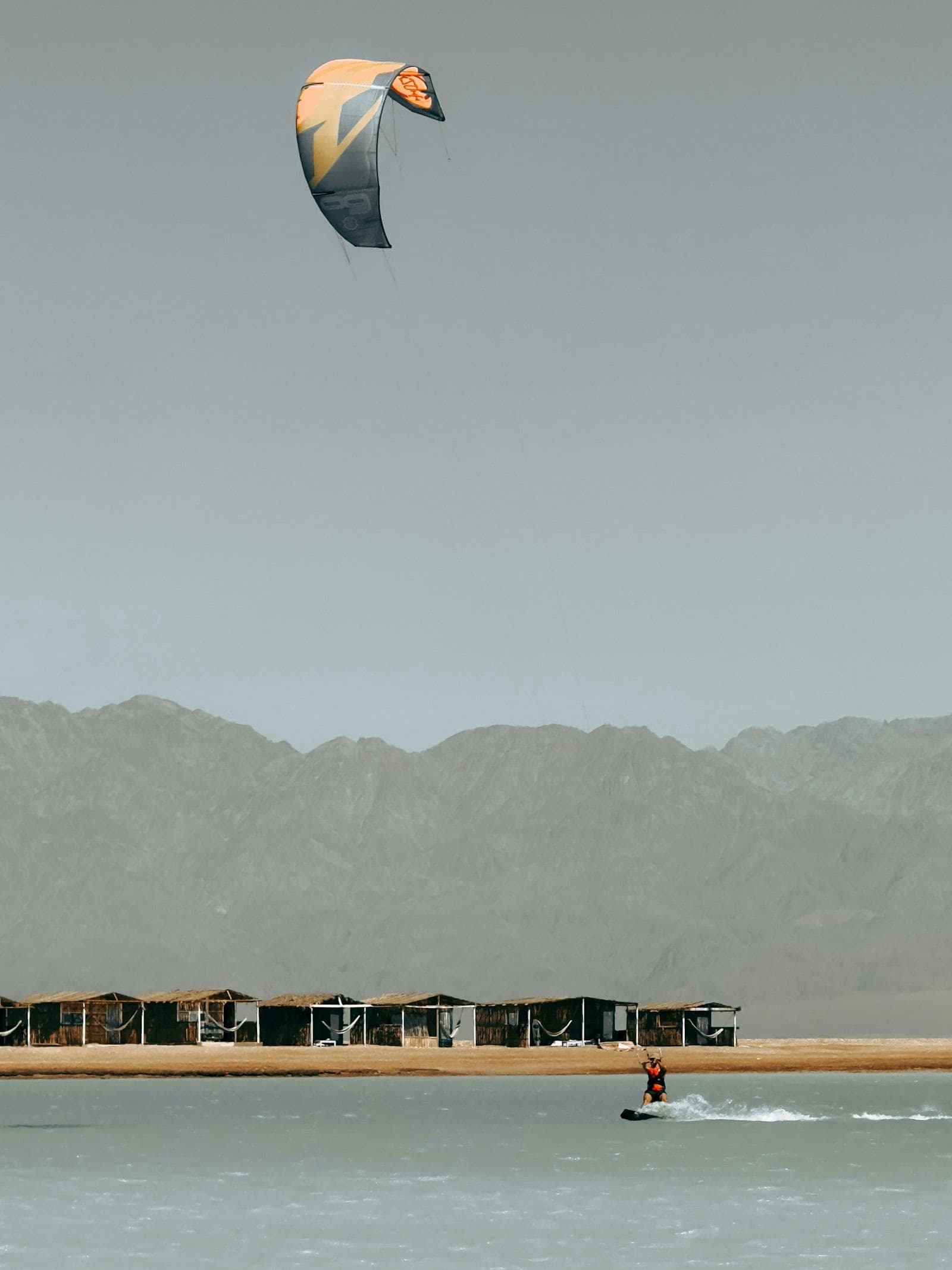 The station huts: rental, lessons, and the wind read each morning.